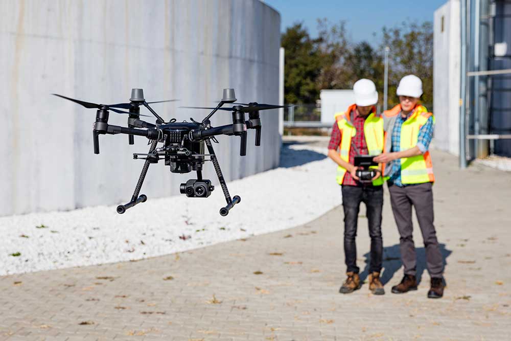 Industrial Drone Operators On Work Site