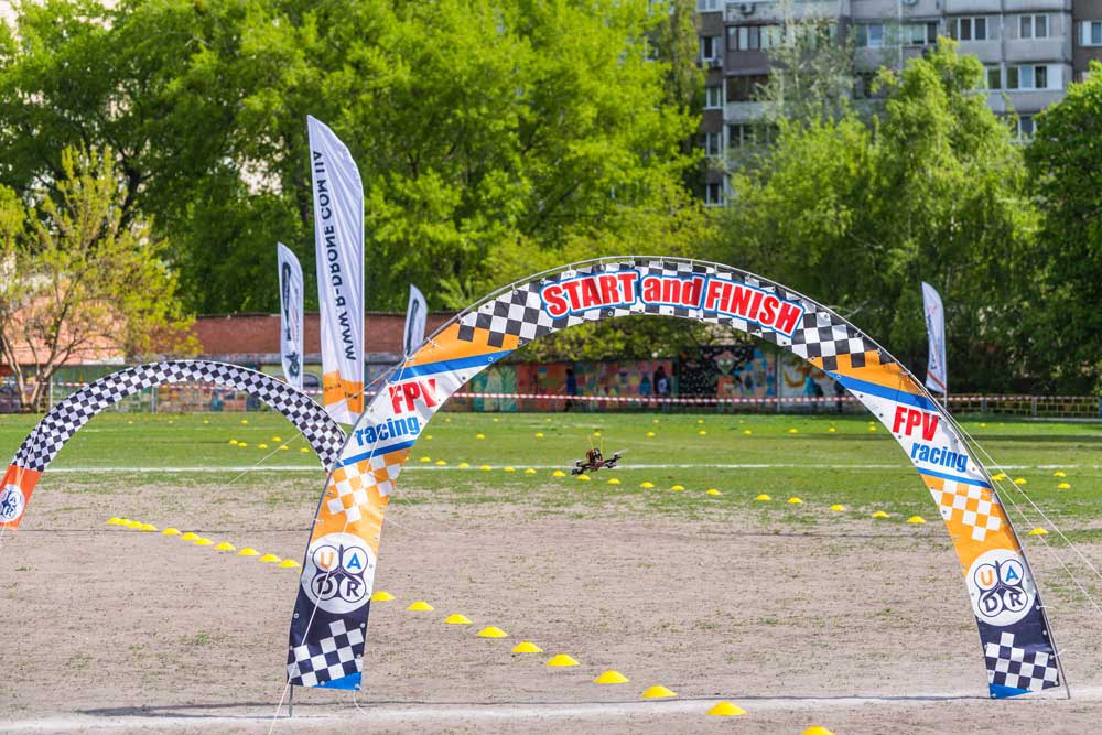 drones racing through finish line